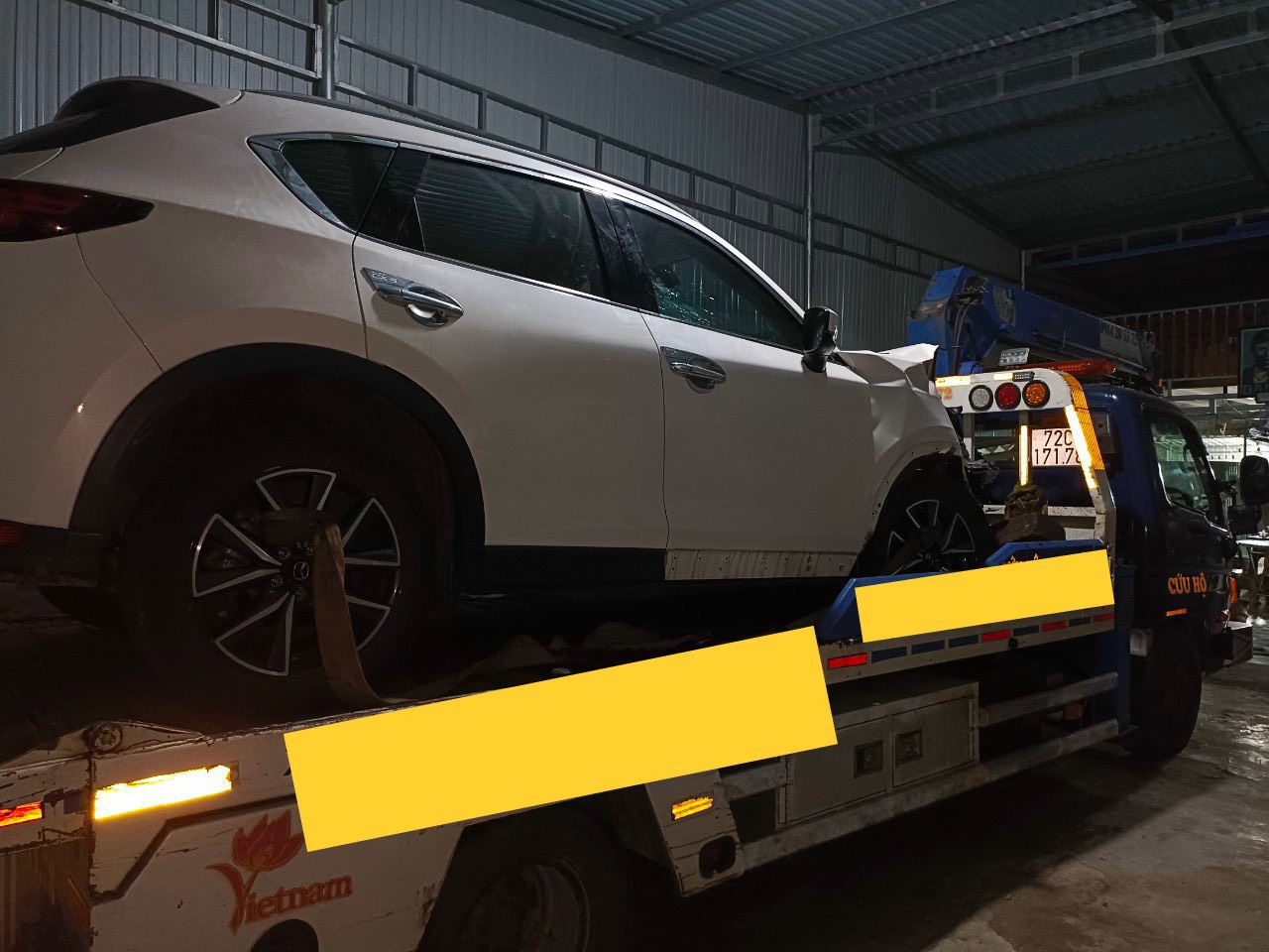 kéo xe xuống hầm